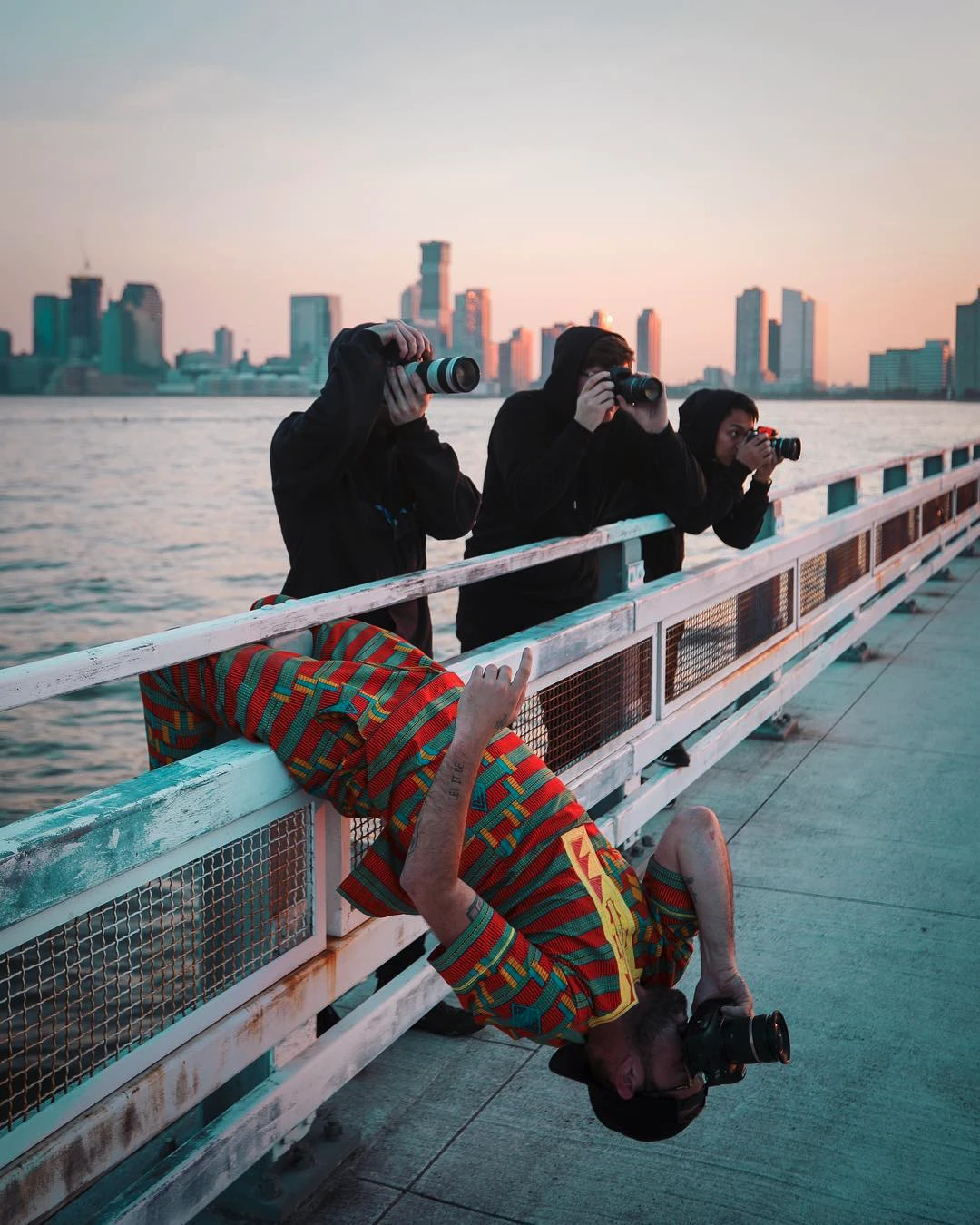 3 photographers & Dan Mace, while Dan is finding a different angle. Upside Down